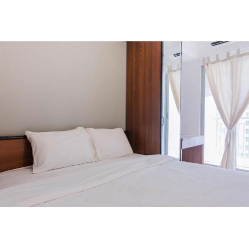 Comfortable 2BR Apartment Serpong M-Town Residence By Travelio