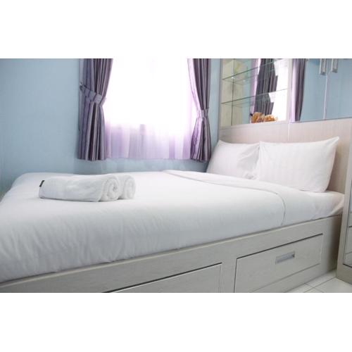Comfortable 2BR Mutiara Bekasi Apartment By Travelio