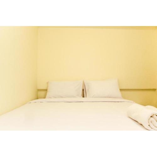 Comfortable 2BR with Study Room at Meikarta Apartment By Travelio