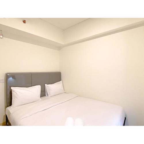 Comfortable 2BR with Working Room at Meikarta Apartment By Travelio