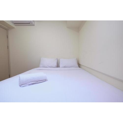 Comfortable 2BR with Workspace at Meikarta Apartment By Travelio