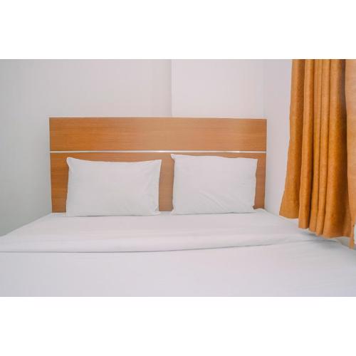 Comfortable and Fully Furnished 2BR Bassura City Apartment By Travelio