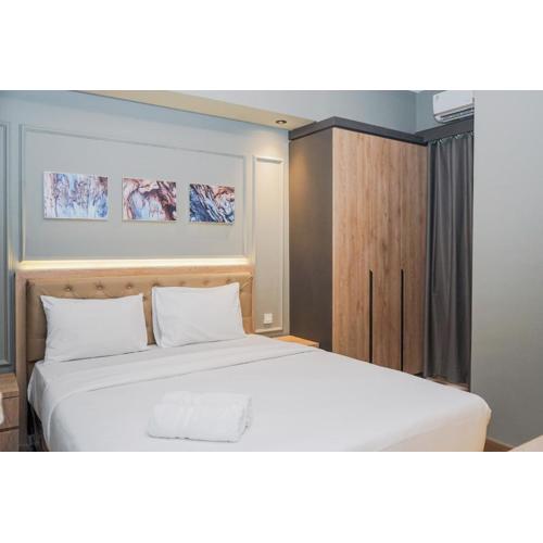 Comfortable and Homey 2BR Apartment at M-Town Residence By Travelio