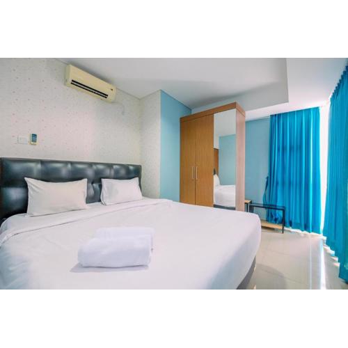 Comfortable and Homey 2BR Apartment at Royal Olive Residence By Travelio