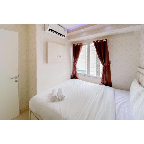 Comfortable and Homey 2BR at Bassura City Apartment By Travelio