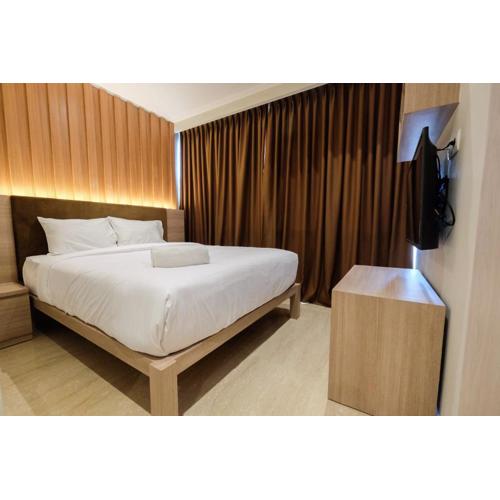 Comfortable and Modern 2BR Menteng Park Apartment By Travelio