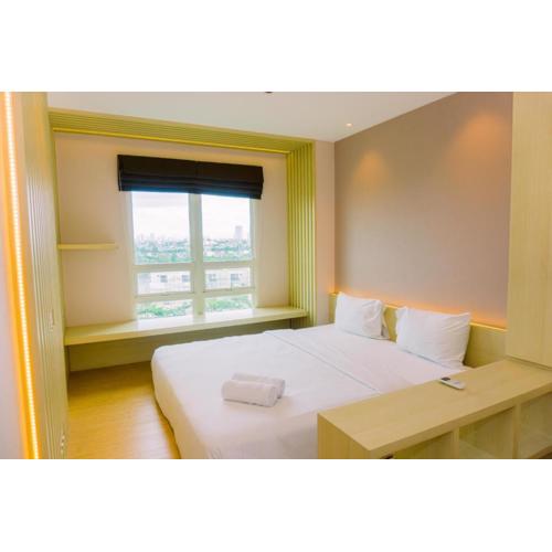 Comfortable and Modern Look 1BR at CitraLake Suites Apartment By Travelio