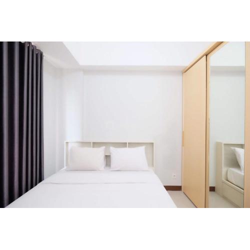 Comfortable and Simply Look 2BR Royal Heights Apartment By Travelio