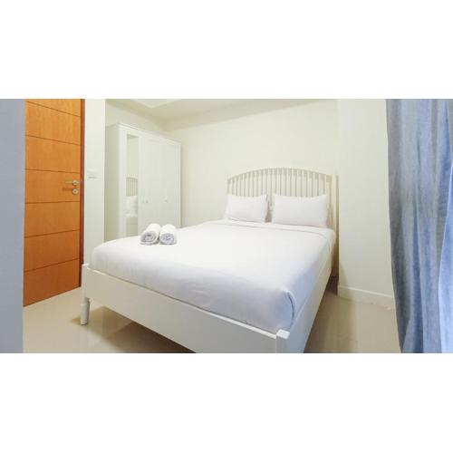 Comfortable and Tidy 2BR at Vida View Apartment By Travelio