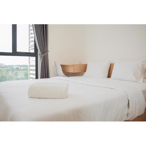 Comfortable Design 2BR with Washing Machine Sky House BSD Apartment By Travelio