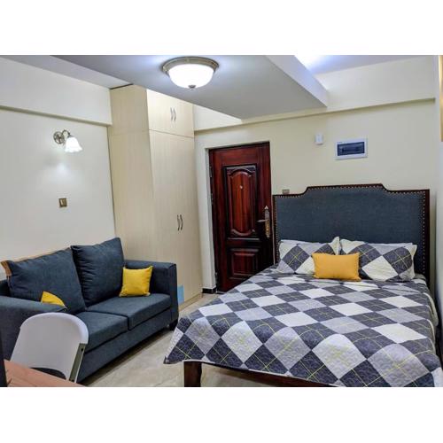 Comfortable fully-equipped studio with free wifi, gym & amazing rooftop views