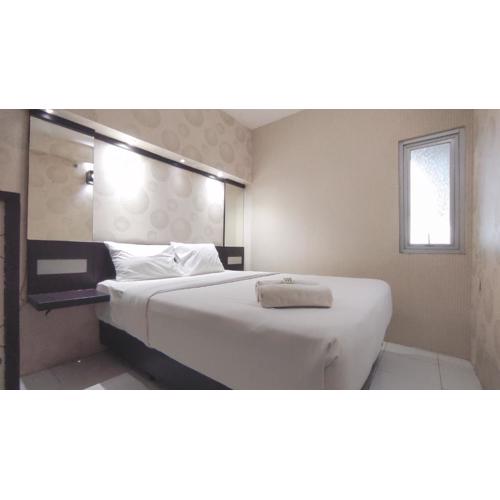 Comfortable Living 2BR at Dian Regency Apartment By Travelio