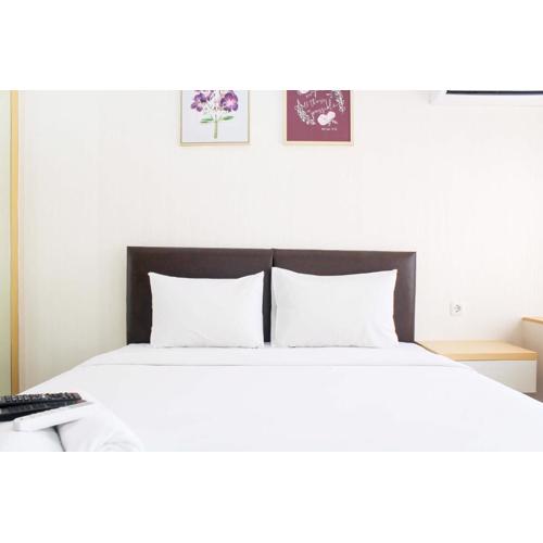 Comfortable Patraland Urbano Studio Apartment near Train Station By Travelio