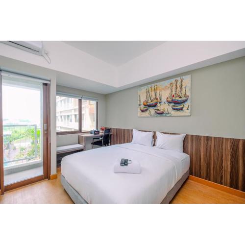 Comfortable Pool View Studio Room at Gateway Park LRT City Jatibening Apartment By Travelio