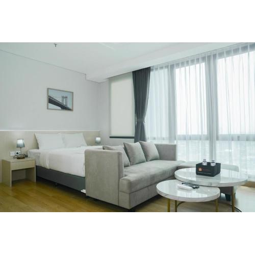 Comfortable Studio Room at Capitol Suites Apartment By Travelio