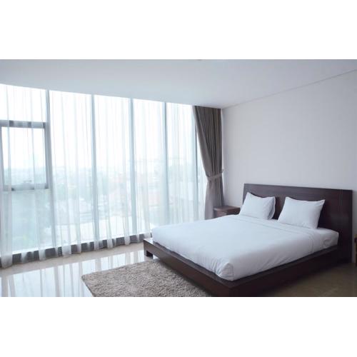 Comfy 1BR L'Avenue Apartment By Travelio