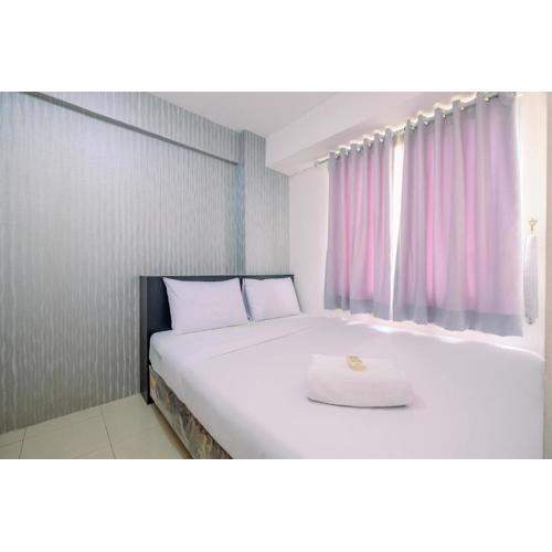 Comfy 2BR Apartment at Bassura City By Travelio