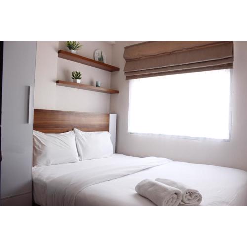 Comfy 2BR Apartment at Grand Asia Afrika By Travelio