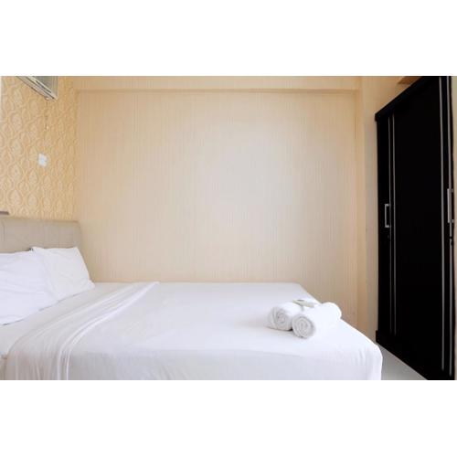 Comfy 2BR Apartment at Green Pramuka City By Travelio