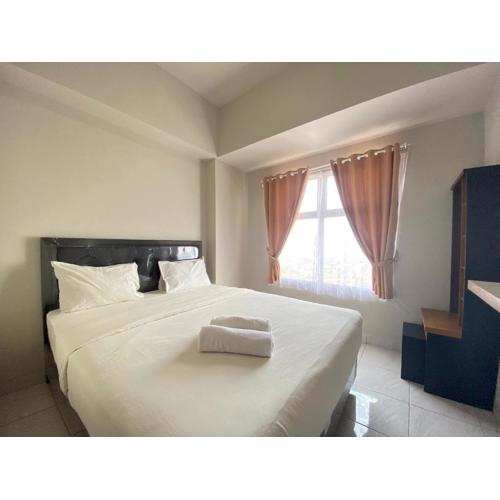 Comfy 2BR Apartment at Newton Residence near Tol Buah Batu By Travelio