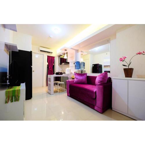 Comfy 2BR Bassura City Apartment near Mall By Travelio