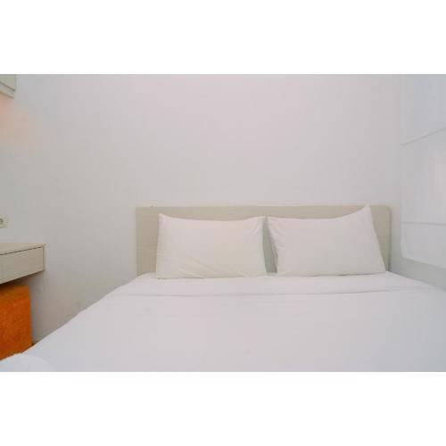 Comfy and Beautiful 2BR Menteng Square Apartment By Travelio