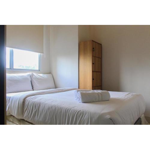 Comfy and Best View 2BR at Serpong Greenview Apartment By Travelio