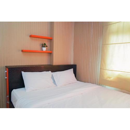 Comfy and Clean 2BR Green Pramuka City Apartment By Travelio