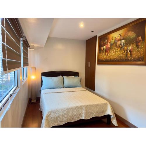 Comfy and Cozy 2BR Condo in BGC with WiFi and Netflix