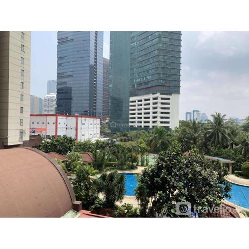 Comfy and Elegant 2BR at Sudirman Tower Condominium Apartment By Travelio