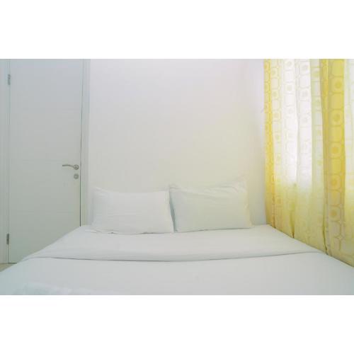 Comfy and Furnished 2BR Bassura City Apartment near Mall By Travelio