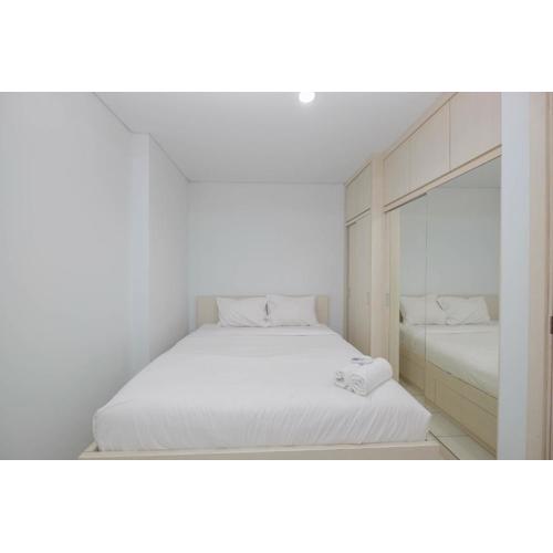 Comfy and Homey 2BR at Patraland Urbano Apartment By Travelio