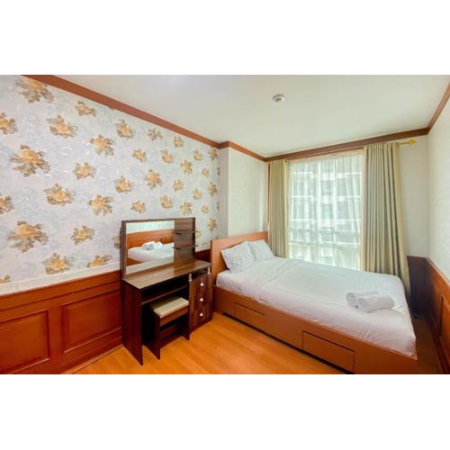 Comfy and Minimalist 1BR Apartment at Woodland Park Residence By Travelio