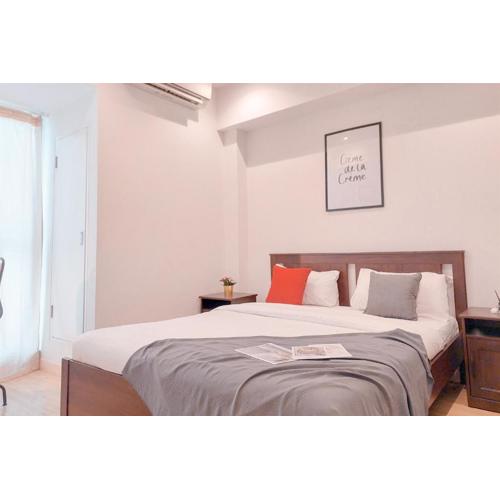 Comfy and Minimalist 1BR Branz BSD City Apartment By Travelio