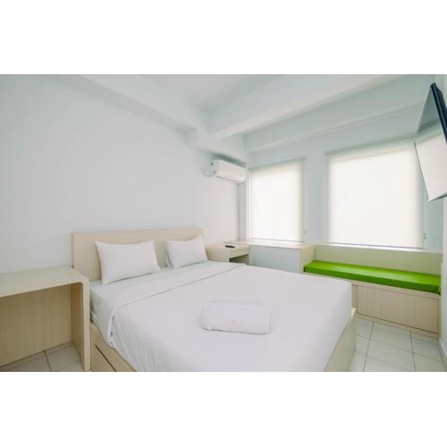 Comfy and Minimalist 1BR Patraland Urbano Apartment near Bekasi Station By Travelio