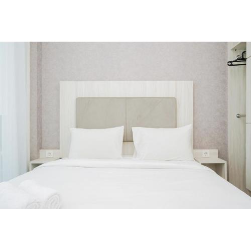 Comfy and Minimalist Studio Apartment at Tree Park City BSD By Travelio