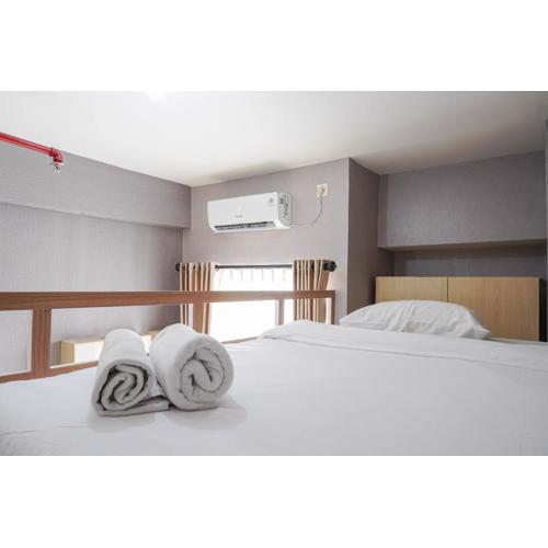 Comfy and Minimalist Studio Dave Apartment near Universitas Indonesia By Travelio