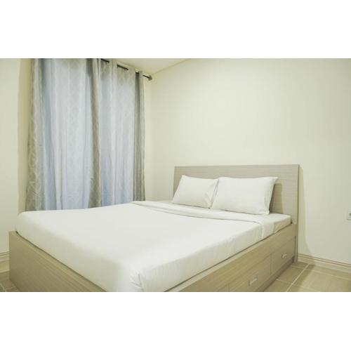 Comfy and Modern 2BR at Meikarta Apartment By Travelio