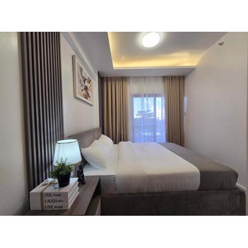 Comfy and Modernly Decorated 2 Bedroom Unit with free Parking