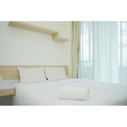 Comfy and Nice Studio at Tree Park City BSD Apartment By Travelio