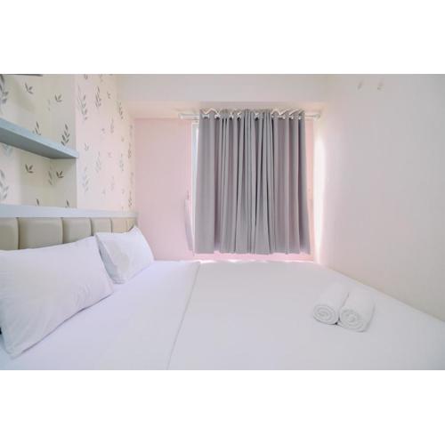 Comfy and Strategic 2BR Apartment at Bassura City By Travelio