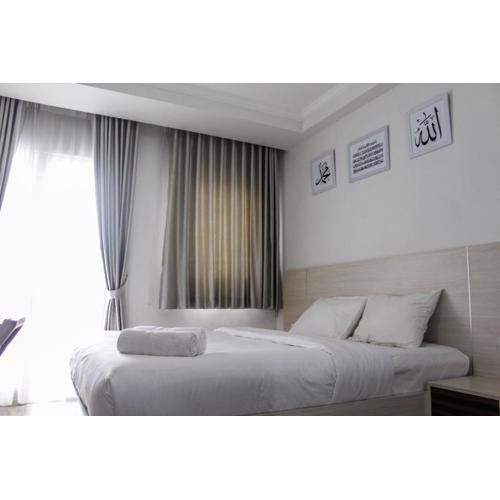 Comfy and Strategic Studio Signature Park Grande Apartment By Travelio