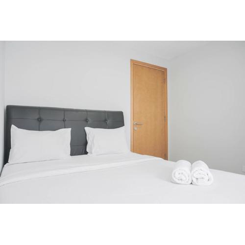 Comfy and Tidy 1BR The Mansion Kemayoran Apartment near JIEXPO By Travelio