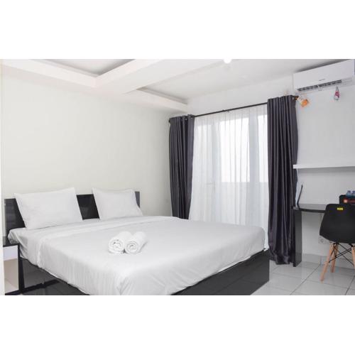 Comfy and Tidy Studio Amethyst Apartment By Travelio