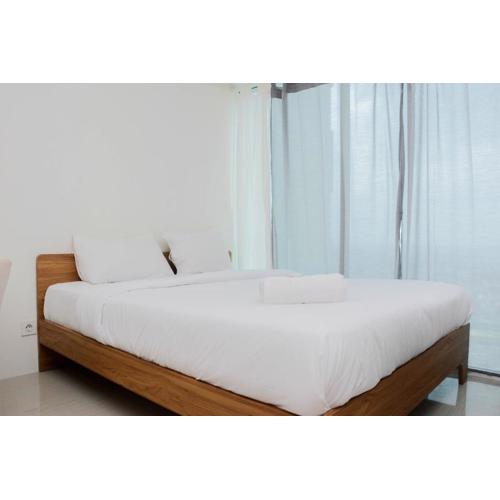 Comfy and Warm Studio Grand Kamala Lagoon Apartment By Travelio