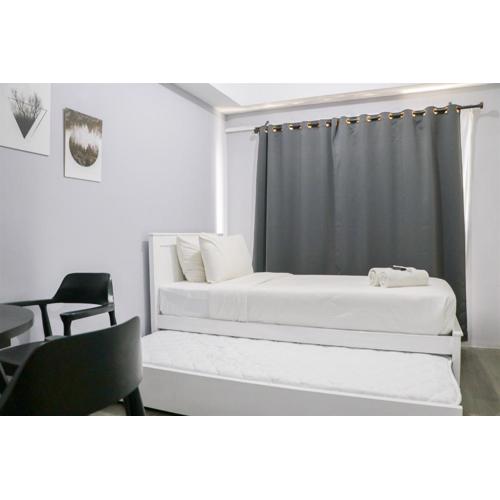 Comfy Studio Apartment at Grand Asia Afrika By Travelio