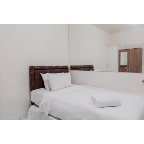 Comfy Studio Apartment No Kitchen at Aeropolis Residence near Soetta By Travelio