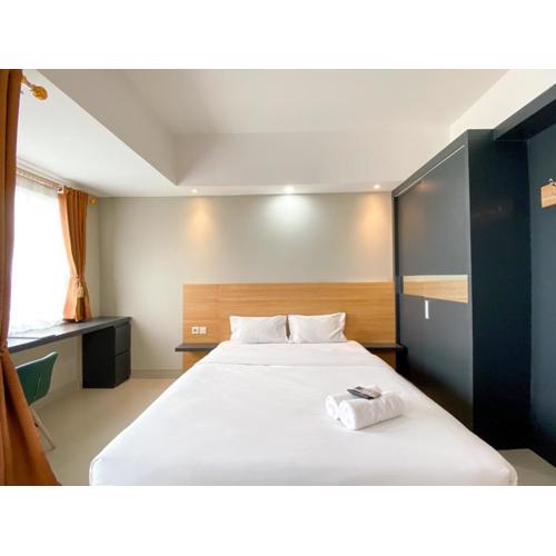 Comfy Studio at Gateway Park LRT City Jatibening Apartment By Travelio