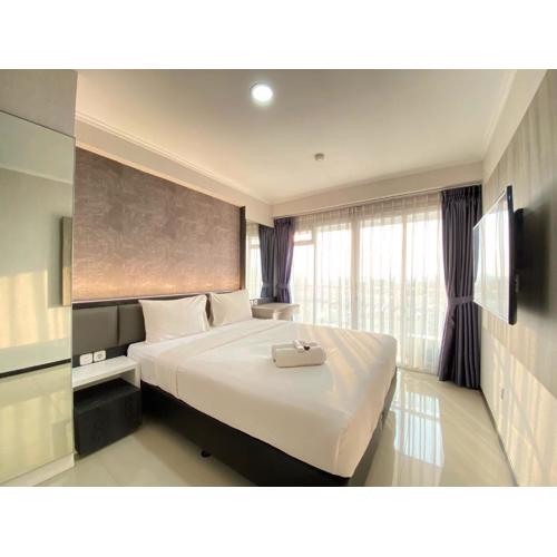 Comfy Studio at Gateway Pasteur Apartment By Travelio