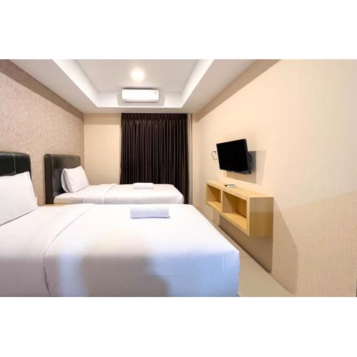 Comfy Studio Room at De Prima Apartment Medan Apartment By Travelio